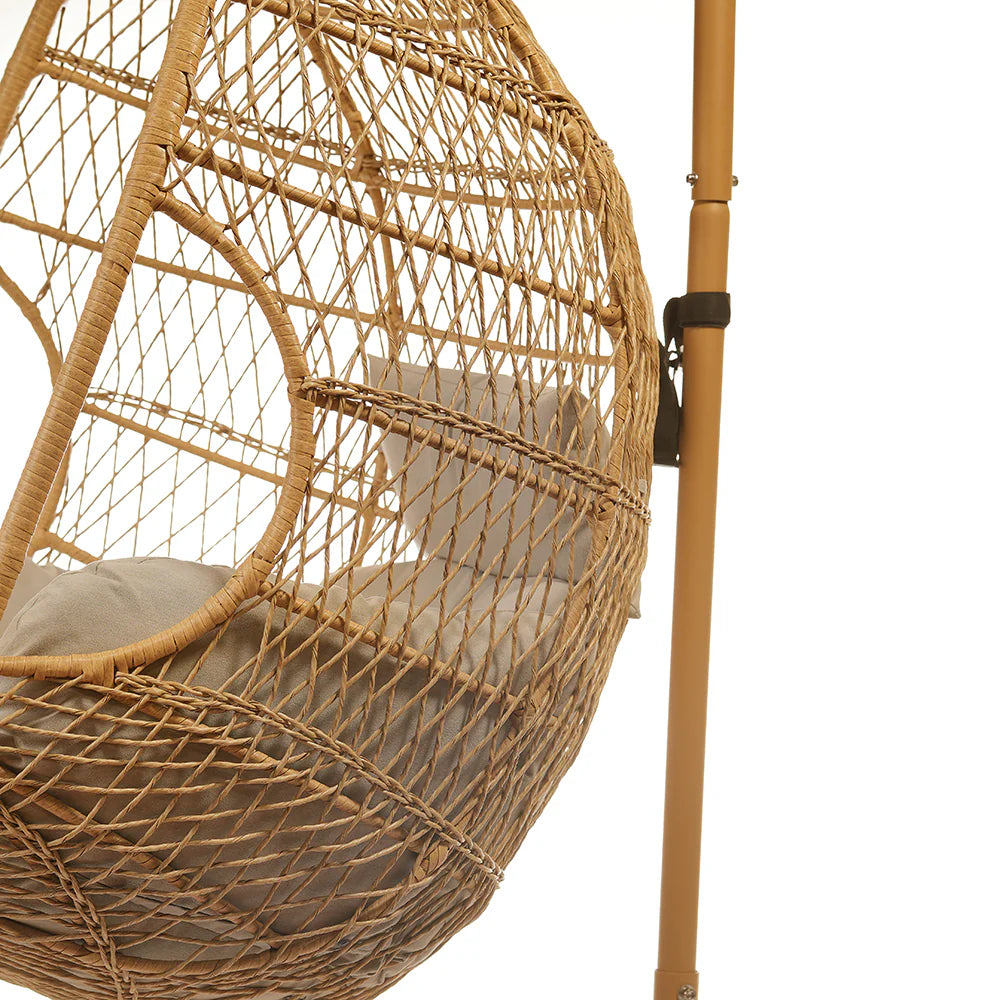 The Serene Cocon Rattan Chair Swing is a beautifully crafted piece designed to provide both comfort and style. Made from durable rattan, this chair swing offers a serene and inviting space for relaxation.