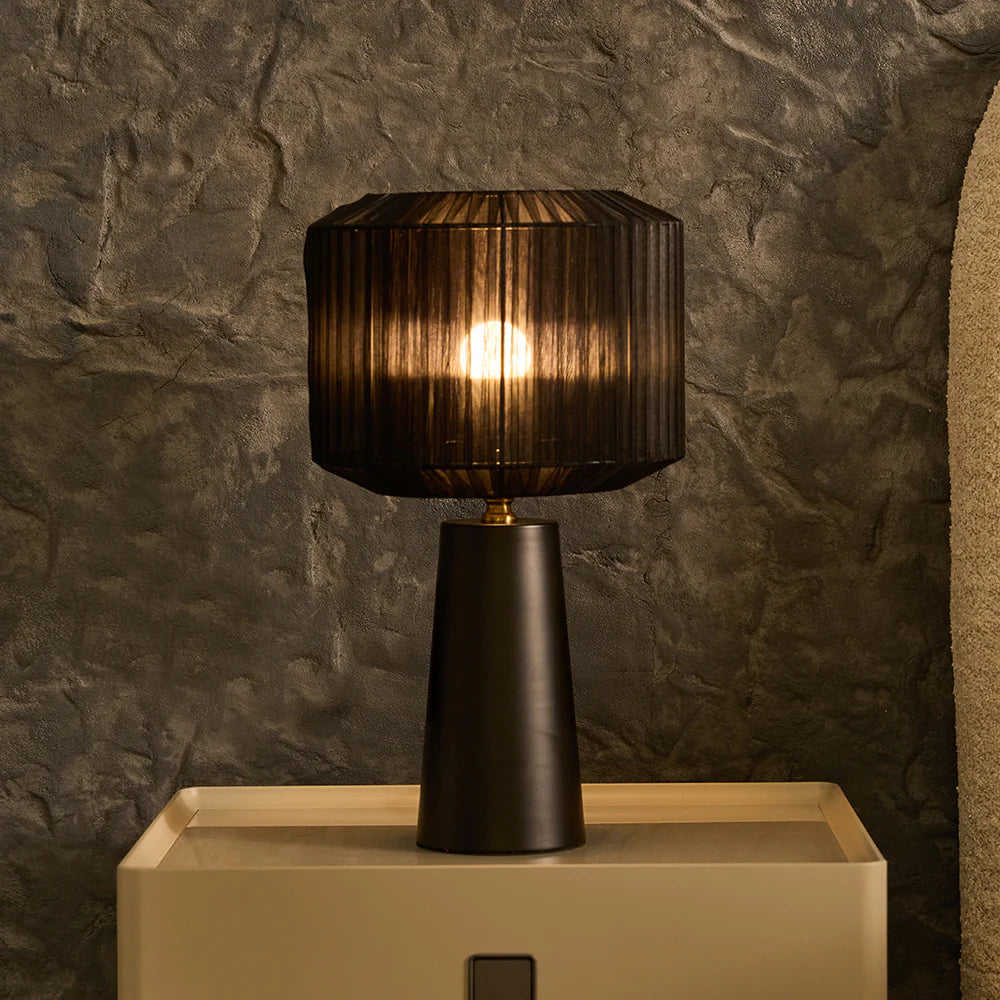 The Shadowflare Table Lamp is designed to make a statement. 