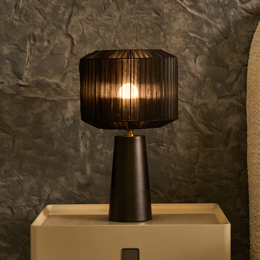 The Shadowflare Table Lamp is designed to make a statement. 
