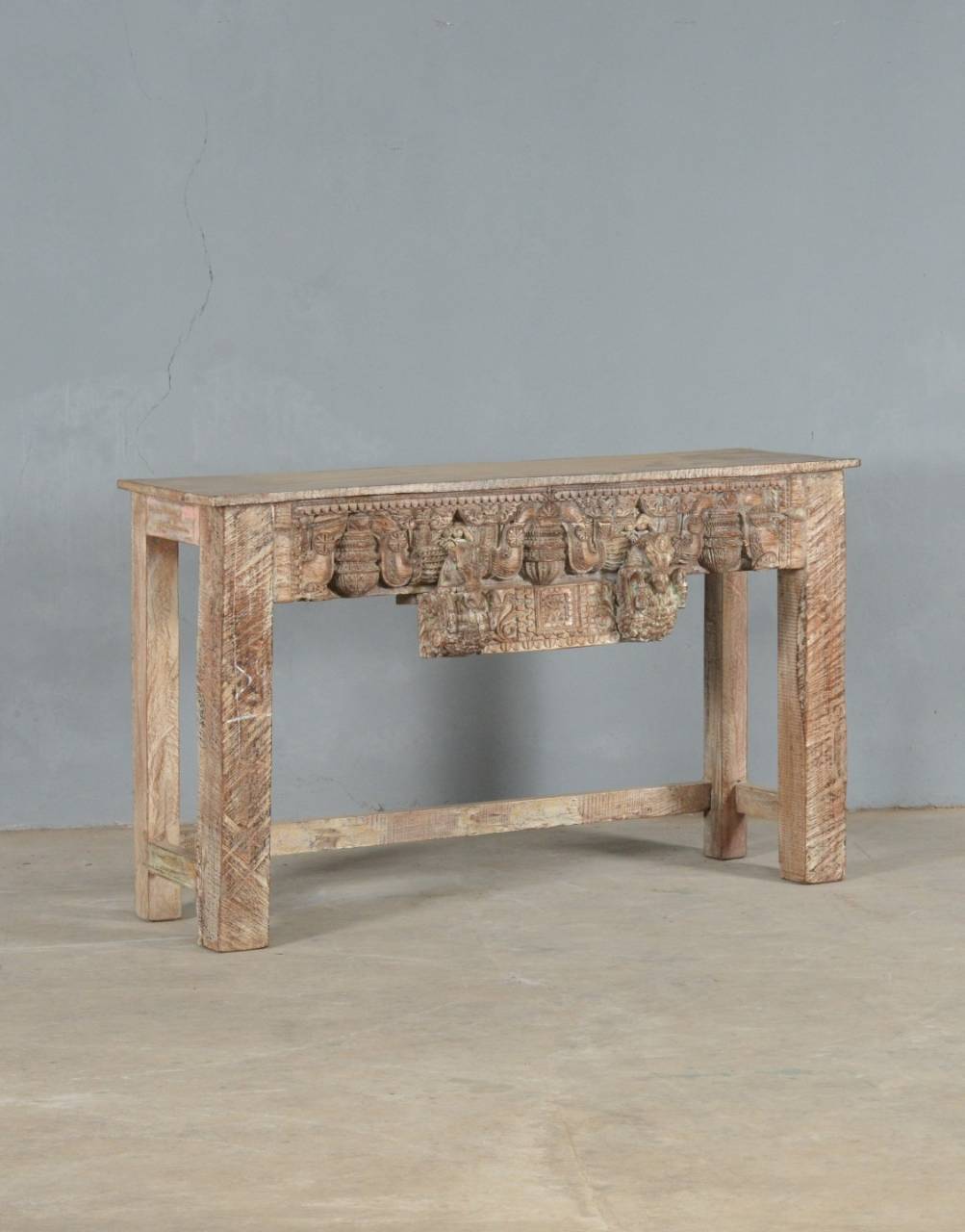 Shahi Virasat hand-carved reclaimed wood console table with intricate elephant and traditional Indian carvings in a whitewashed finish.