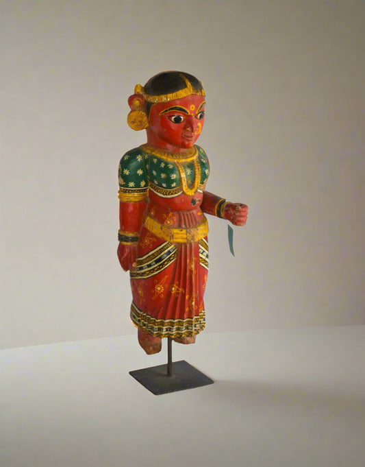The statue depicts a poised woman in traditional attire, radiating Shakti — the dynamic force that empowers and nurtures life. Mounted on a sturdy metal bracket,