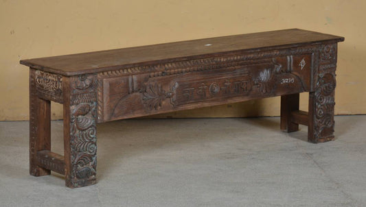  Intricately carved floral motifs, heritage-inspired detailing, and bold architectural legs give this bench the presence of a treasured haveli heirloom. 
