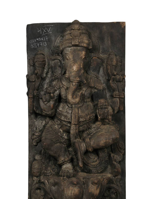 Expertly hand-carved from recycled wood, this majestic panel features two regal depictions of Lord Ganesha, seated in classical poses, adorned with detailed ornaments and sacred weapons, embodying strength, compassion, and spiritual power.