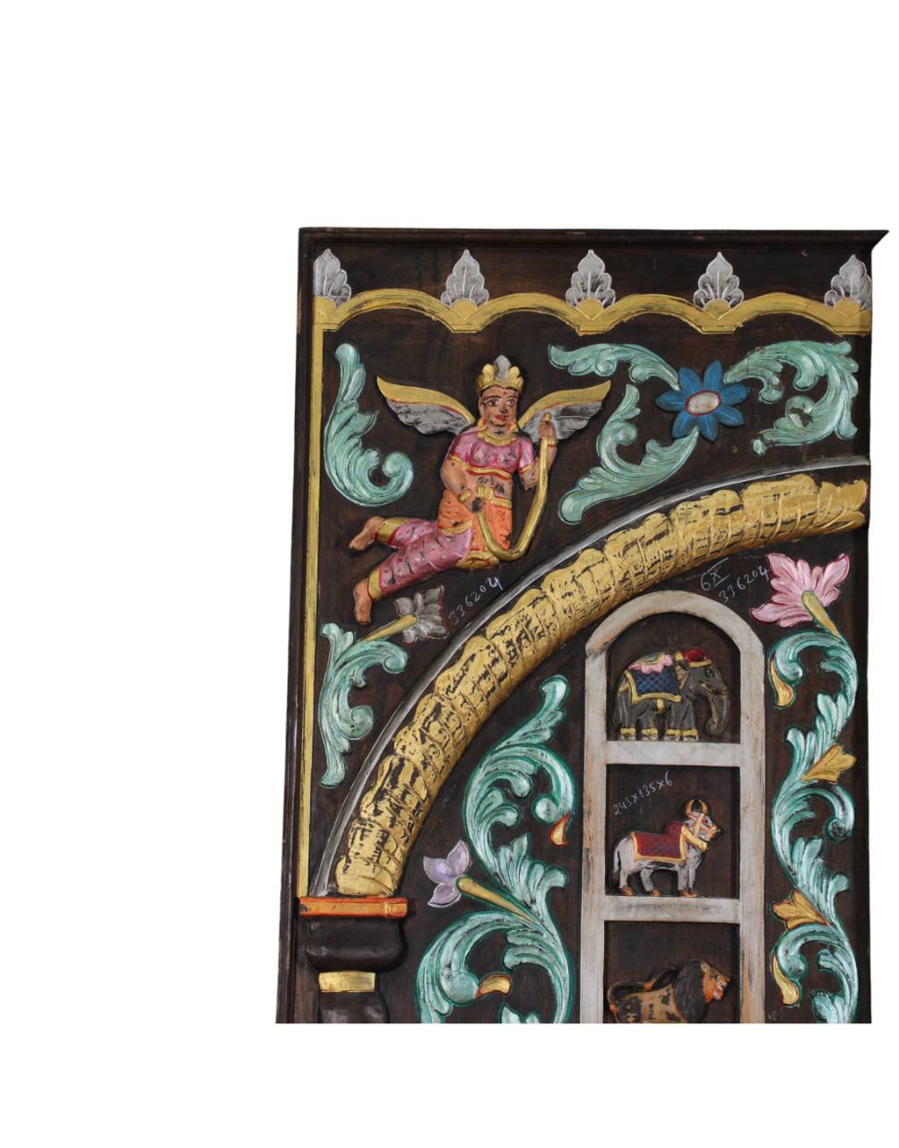 Each carved section tells a story — from celestial beings to sacred emblems like the Shankh (conch), Kalash (sacred pot), Trishul (trident), and Chakra,
