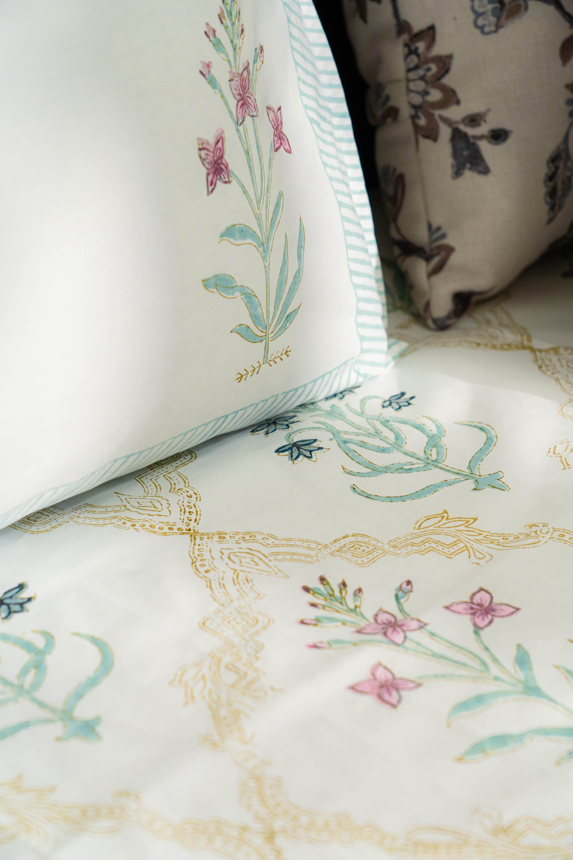 Floral embroidery on a white fabric background