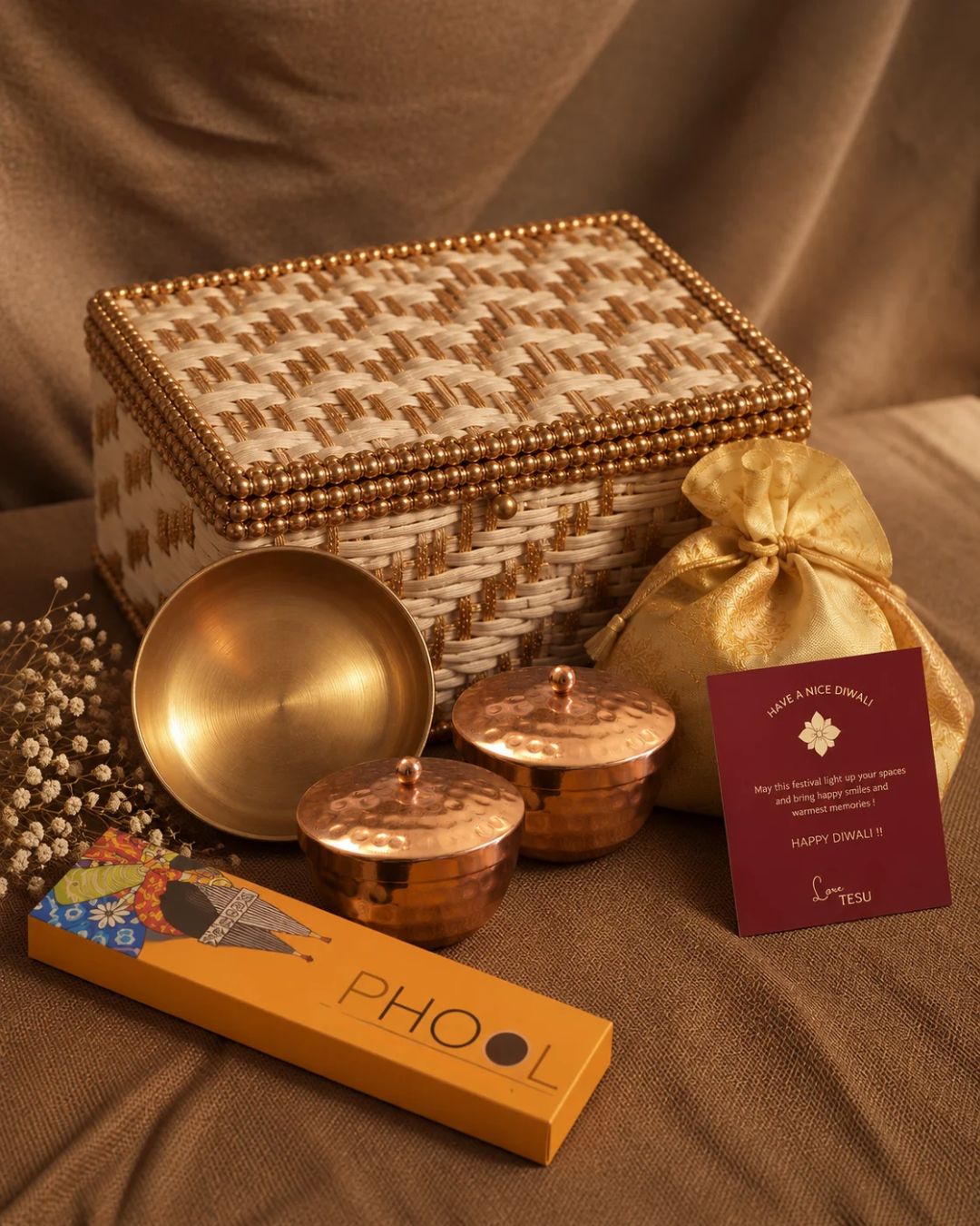  Its cream-and-gold woven presentation brings together warm festive colours and elegant detailing, creating a thoughtful Diwali gift for friends, family and loved ones.