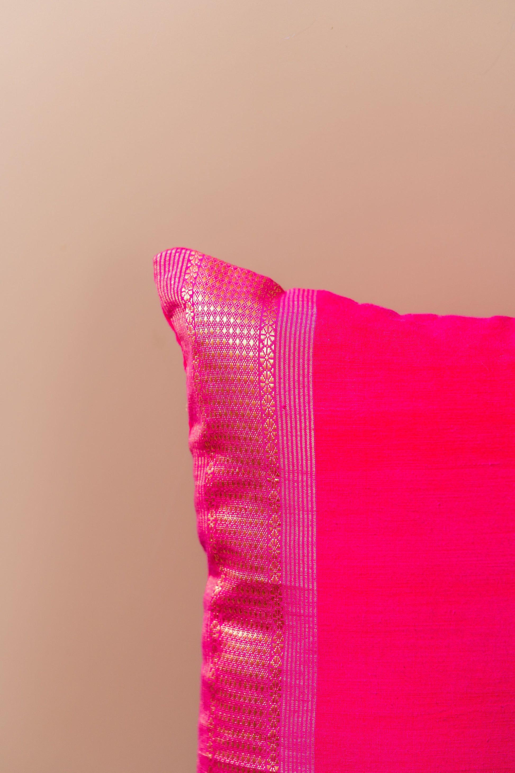 Magenta and gold lumbar cushion cover
Luxurious lumbar pillow
Sophisticated home decor
Broad border cushion cover
Rich magenta fabric
Elegant golden border
Statement piece for sofa
High-quality cushion cover
Comfortable lumbar support
Vibrant colors decor
Chic design cushion
Modern and traditional interiors
Elevate home aesthetics
Stylish accent chair cushion
Decorative lumbar pillow