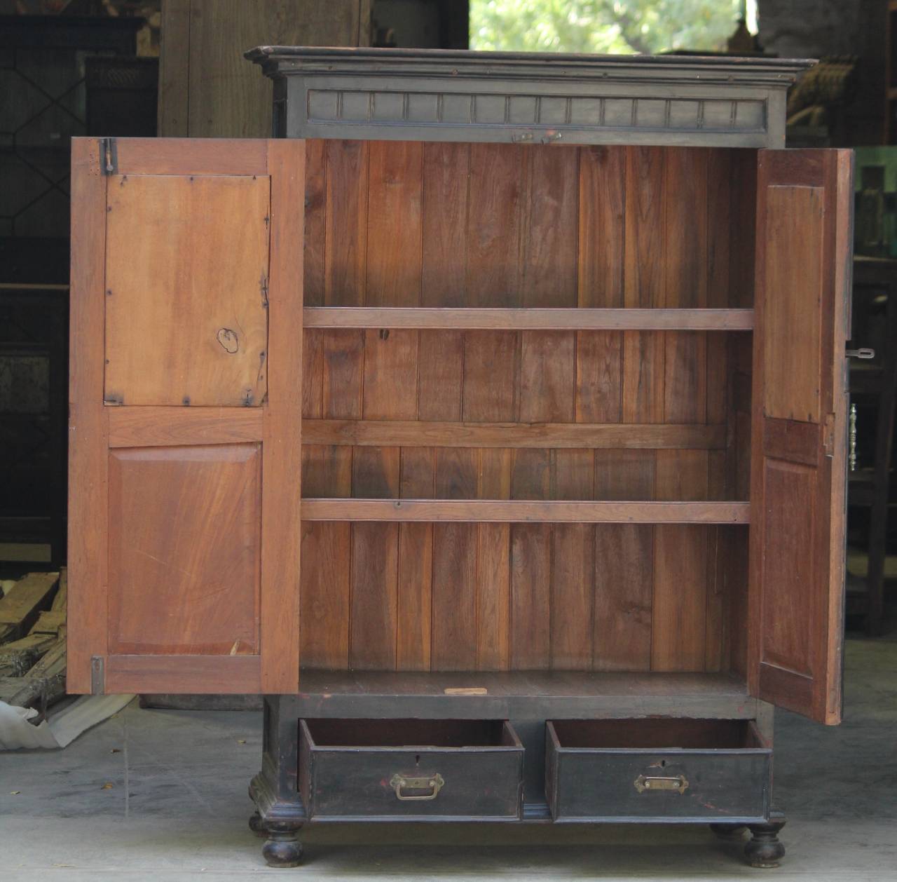 A Timeless Wooden Cabinet is a stylish and functional piece of furniture that blends the warmth and charm of rustic design with the practicality of wooden storage.