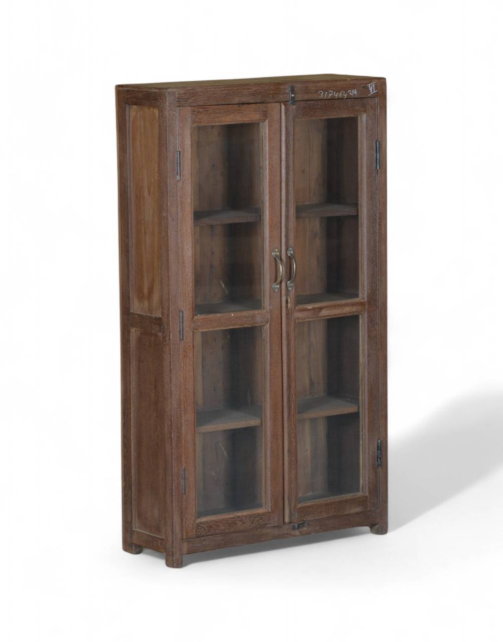 Elevate your home décor with this beautifully Teak Wood Glass Display Cabinet. Featuring glass-paneled doors for an elegant touch, this cabinet provides ample shelving to showcase your treasured collectibles, books, or decorative pieces. 