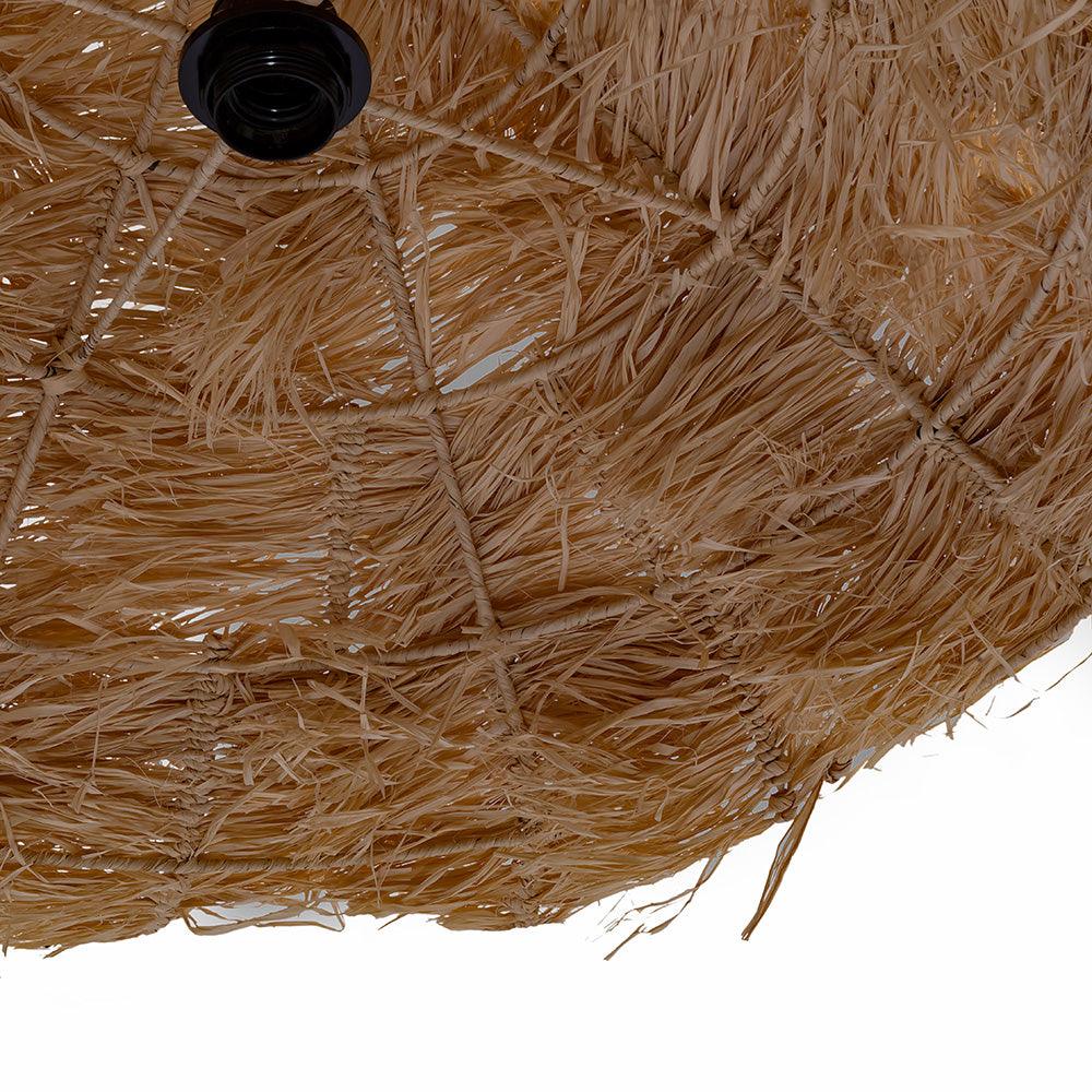 Close-up of a brown bristle brush on a white background