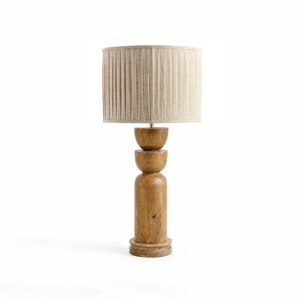 Wooden table lamp with a beige pleated shade on a white background