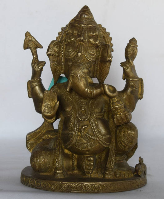  Symbolizing wisdom, prosperity, and the removal of obstacles, this intricately detailed idol features traditional ornaments, four arms holding sacred objects, and his loyal vahana (mouse) at his feet. 