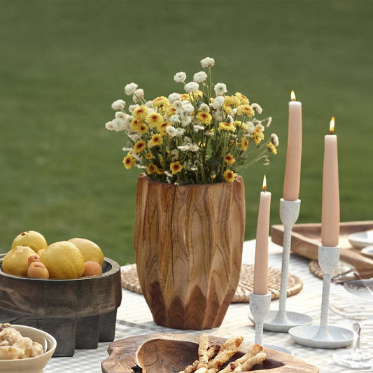 The Forest Echo Vase captures the quiet whispers of the woods in its flowing grain and sculpted form. 
