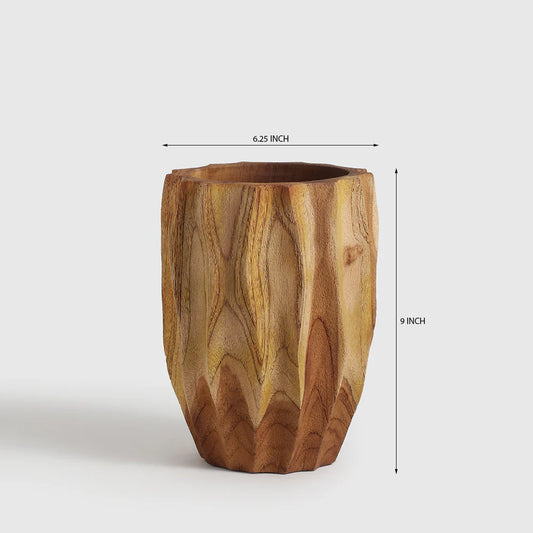 The name reflects the vase’s natural rhythm — as if echoing the stillness and strength of a forest.