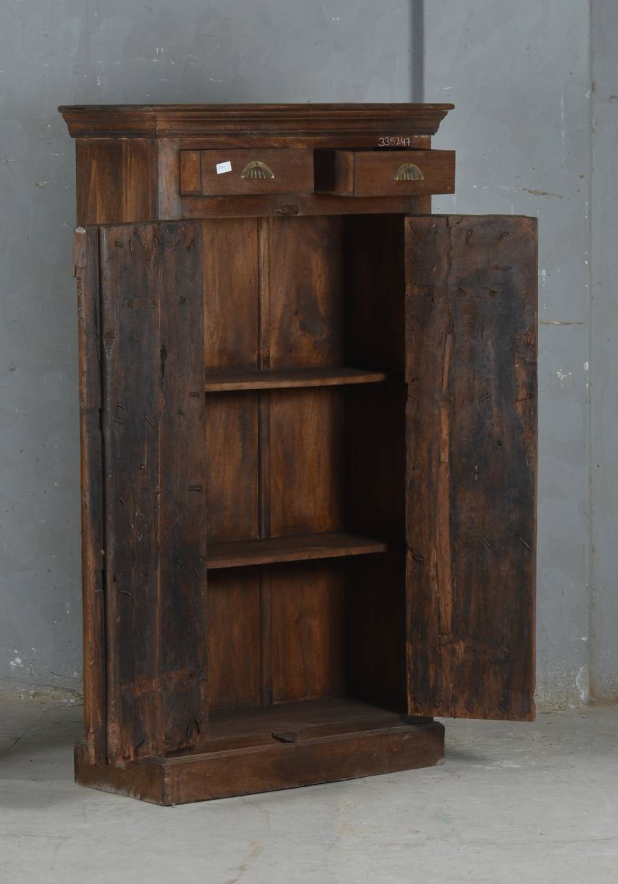  this wooden almirah combines rustic charm with practical storage. 