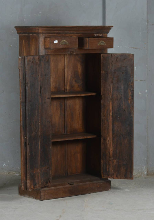  this wooden almirah combines rustic charm with practical storage. 