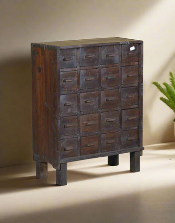 Discover the charm of the Timber Legacy Cabinet, a beautifully handcrafted multi-drawer chest made from premium reclaimed teak wood. Featuring a vintage-inspired design with multiple storage compartments.