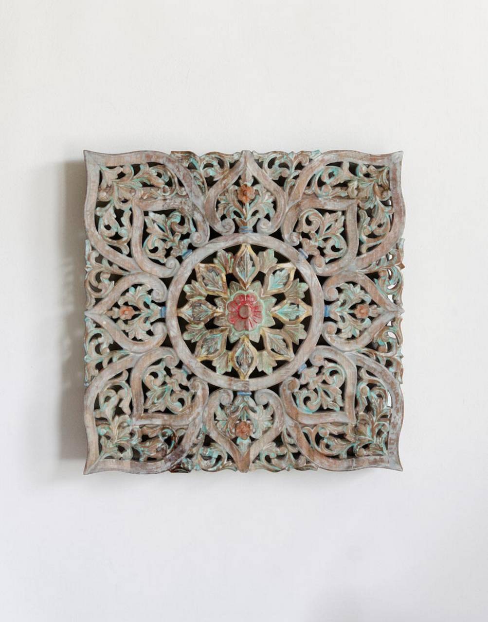 featuring an intricately hand-carved floral motif with a central lotus bloom—a symbol of purity,