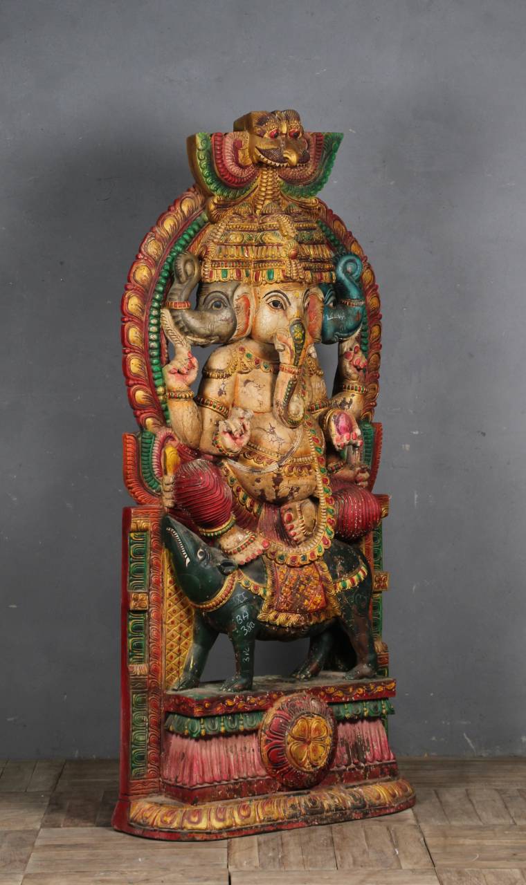 This intricately detailed masterpiece showcases Lord Ganesha in a traditional pose, adorned with rich embellishments and vibrant colors that reflect cultural heritage..