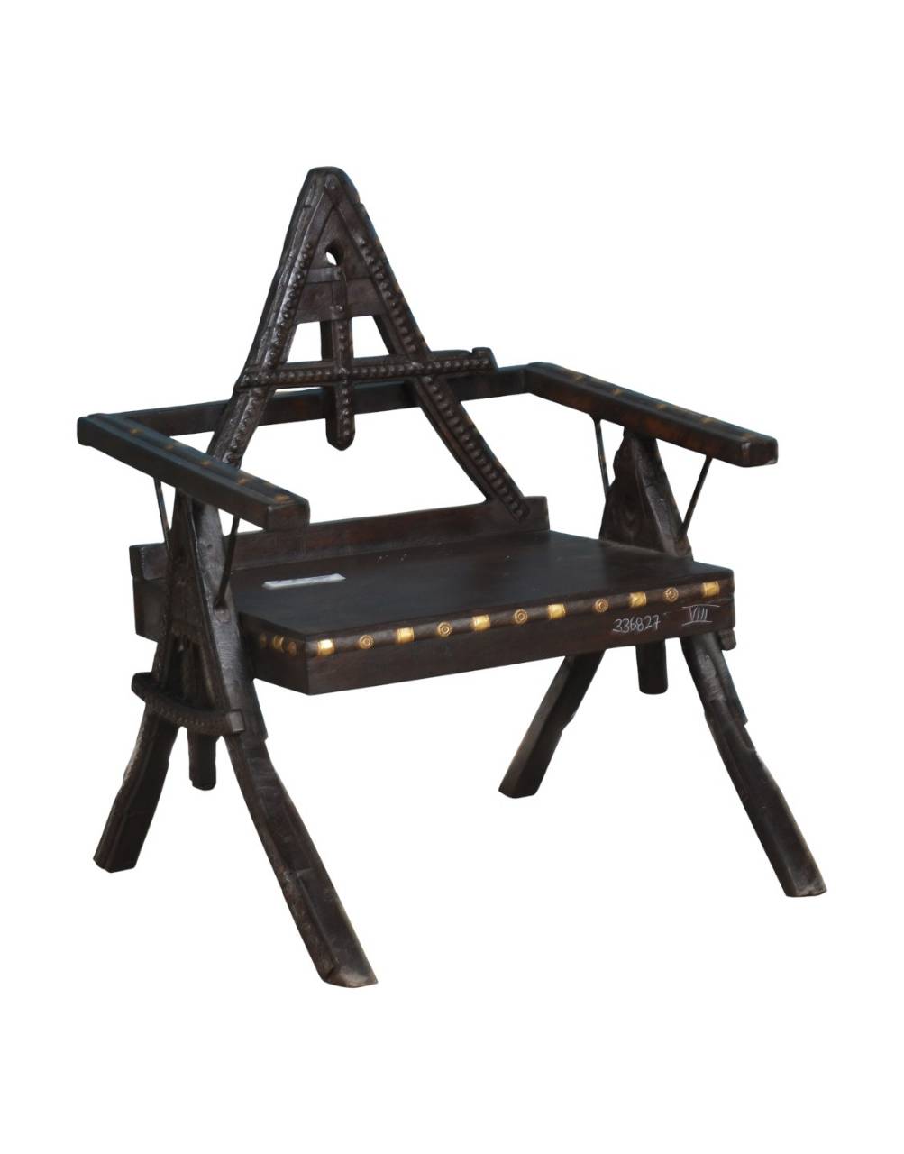 triangle back wooden chair, teak wood armchair, brass studded chair, rustic accent chair, antique wood and iron chair, handcrafted wooden seating, tribal design chair, heritage furniture India, vintage wooden armchair