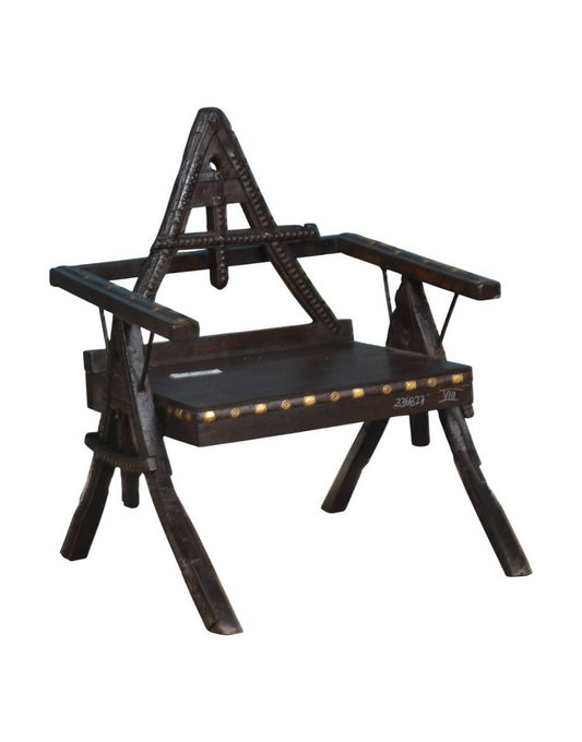 triangle back wooden chair, teak wood armchair, brass studded chair, rustic accent chair, antique wood and iron chair, handcrafted wooden seating, tribal design chair, heritage furniture India, vintage wooden armchair