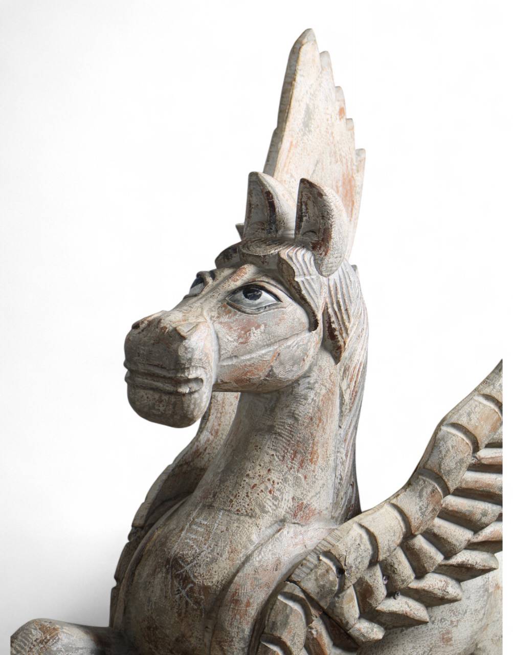 Udan Ashwa Handcrafted Sculpture depicting a stylized flying horse, crafted with fine detailing and artistic form, symbolizing movement, freedom, and traditional craftsmanship in a refined decorative finish.