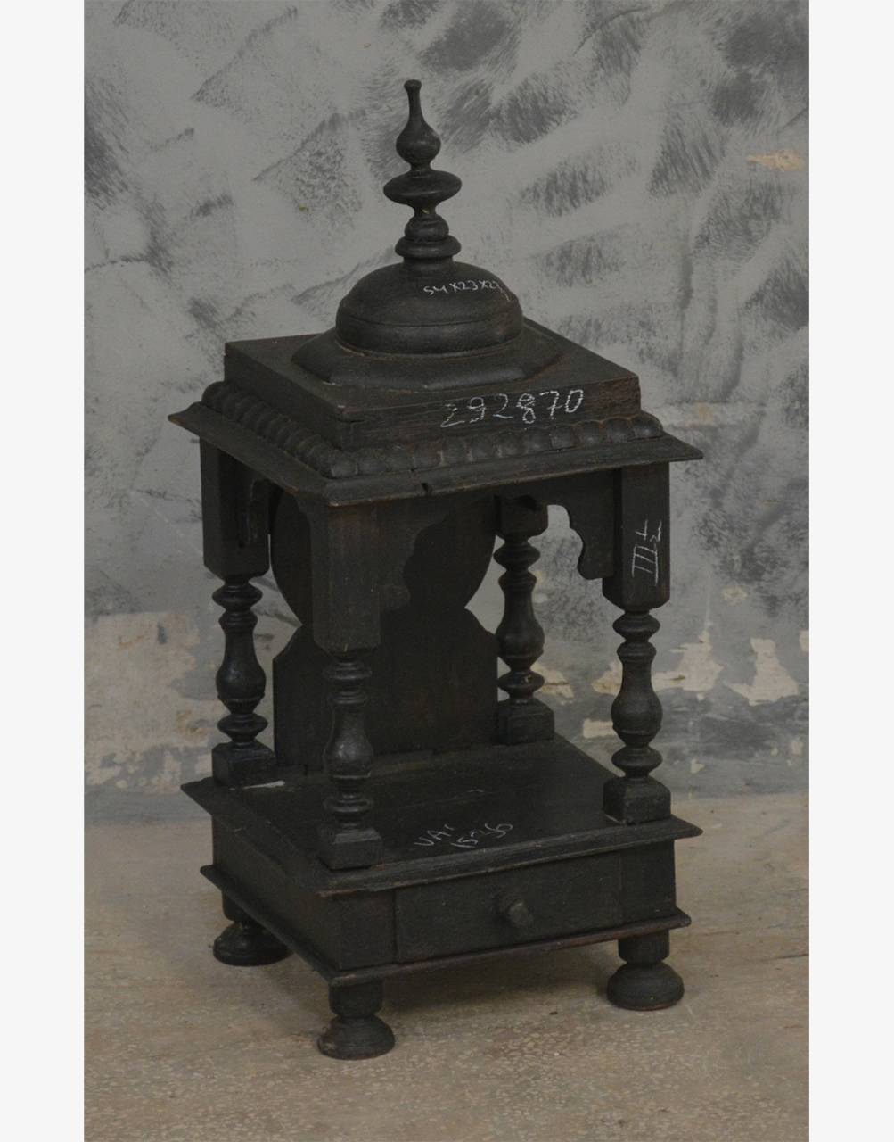 Thoughtfully handcrafted from premium teak wood, this temple stands tall in a majestic black finish, symbolizing depth, devotion, and timeless grace.