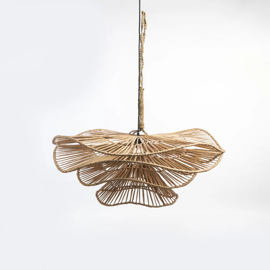 Woven rattan pendant light on a white background