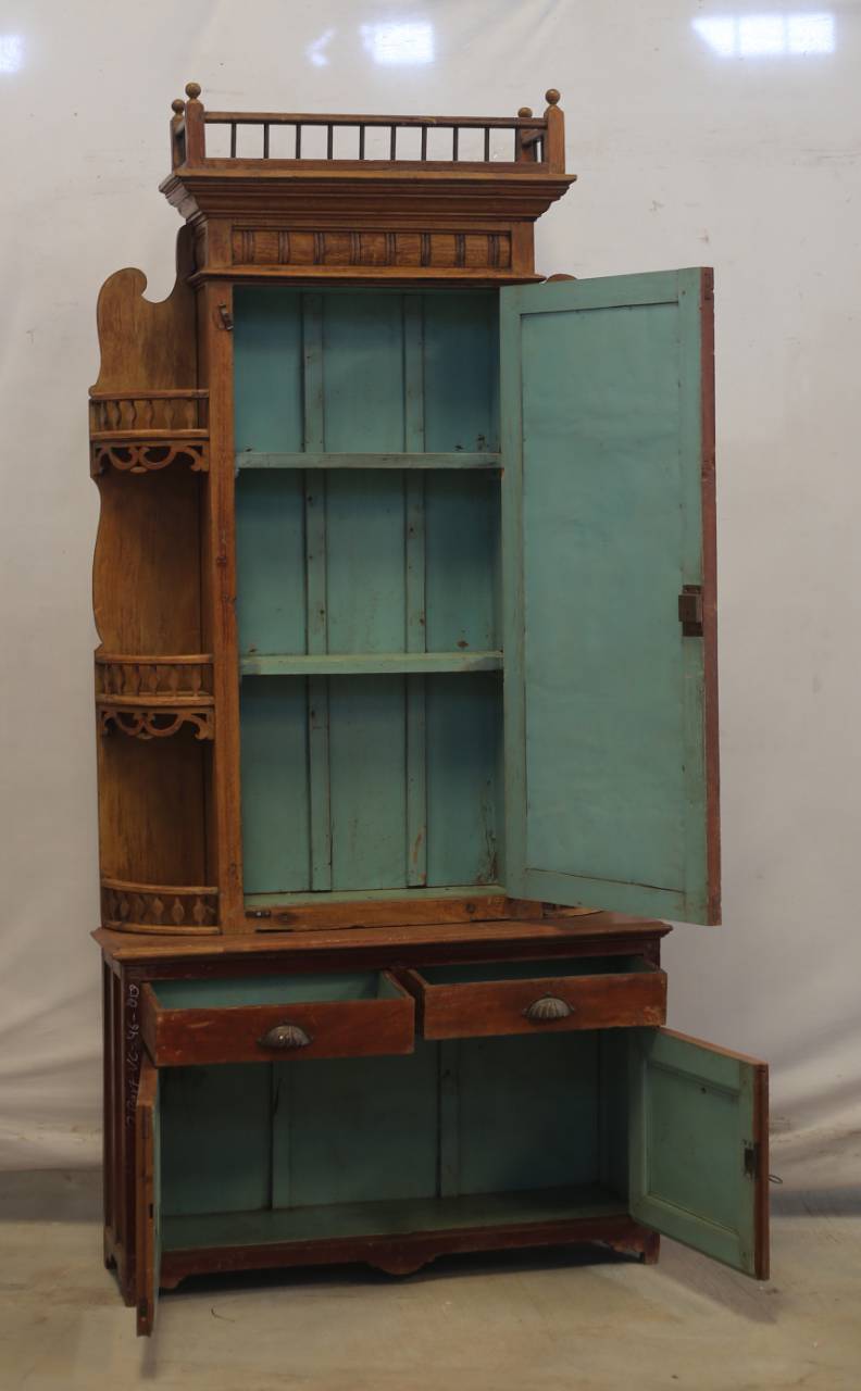 Wooden cabinet with open doors on a white background