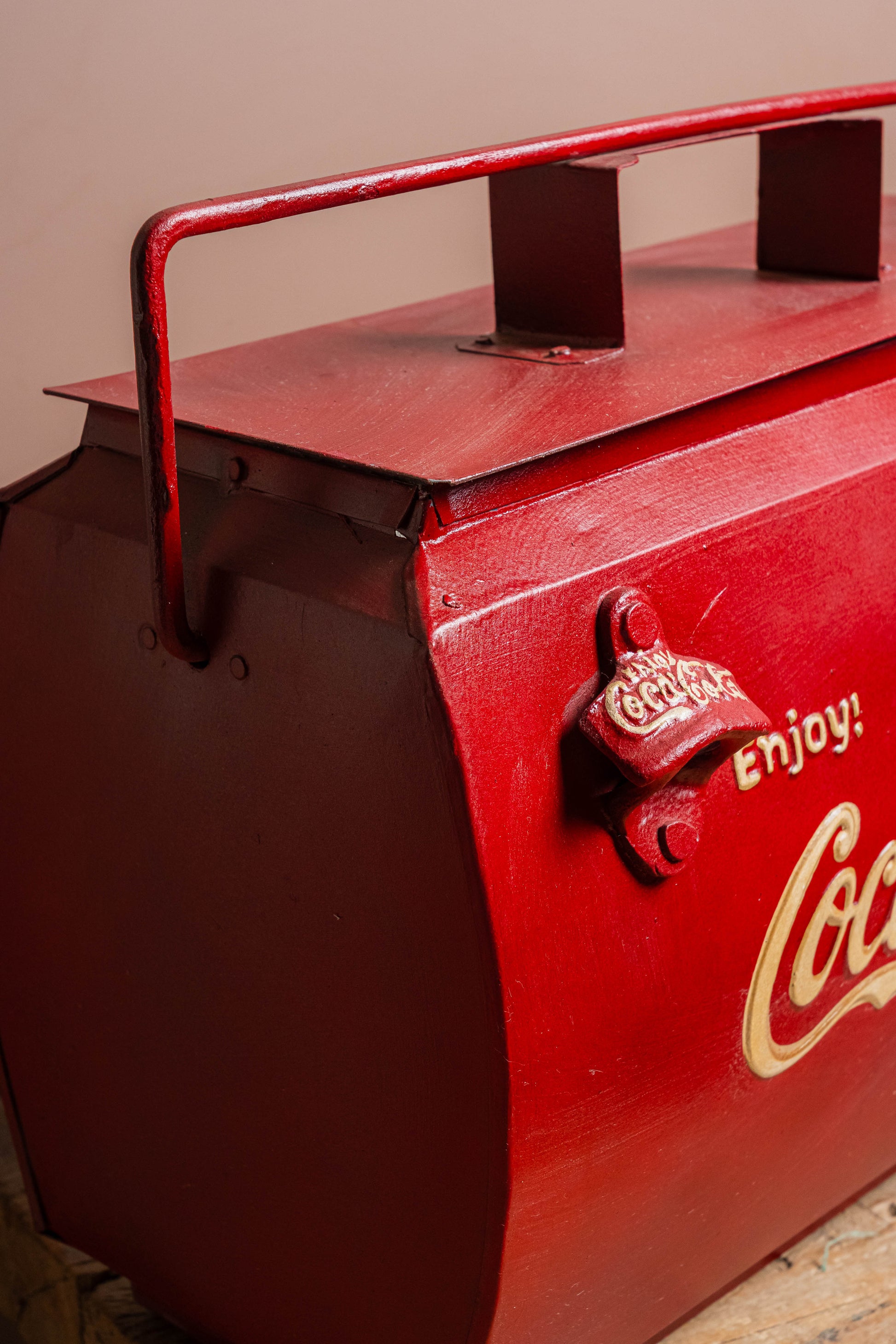 Featuring the iconic Coca-Cola red finish with the timeless "Enjoy Coke" logo, it evokes a sense of classic Americana. 