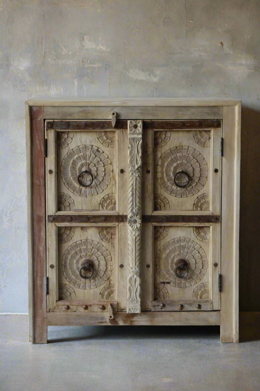 Elevate your interiors with the Vintage Lotus Cabinet, a stunning piece handcrafted from sustainable solid mango wood. 