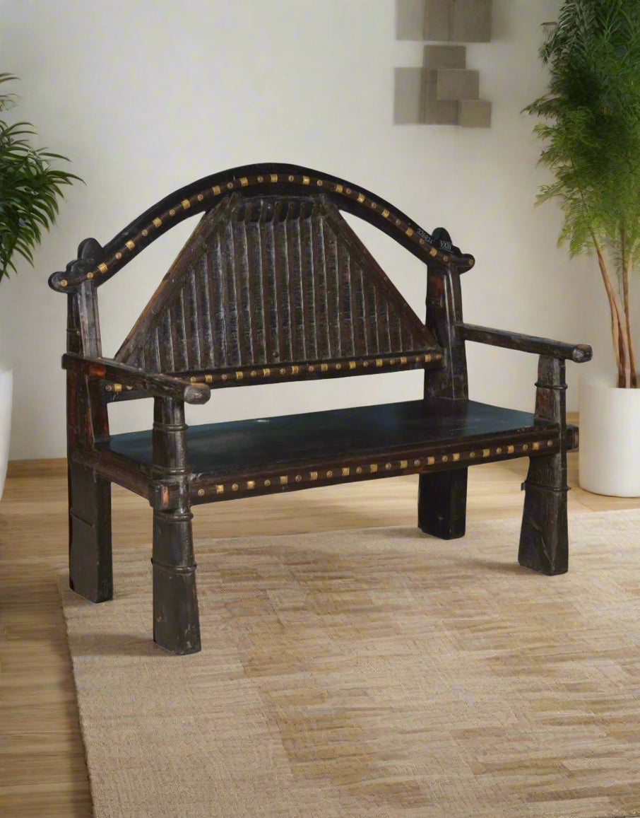 Bring timeless charm to your space with the Vintage Wooden Sofa with Brass Work