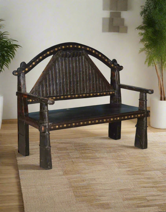 Bring timeless charm to your space with the Vintage Wooden Sofa with Brass Work