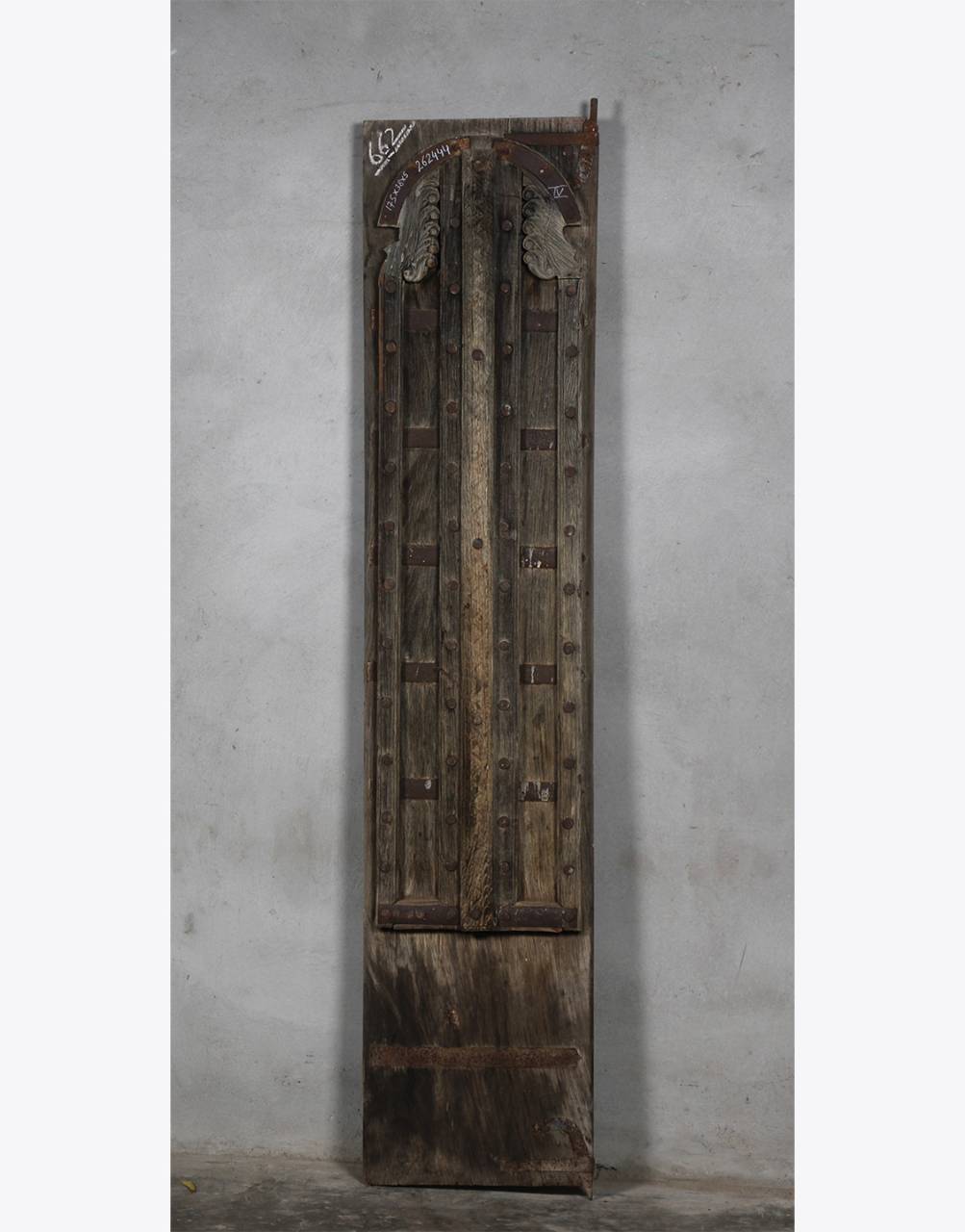 Wooden-Iron Door Panel. Crafted from premium Teak Wood, this visually appealing piece features exquisite iron work for a touch of elegance. Durable and handcrafted, it adds traditional charm to any space. Upgrade with confidence and trust in timeless quality for a sophisticated touch.