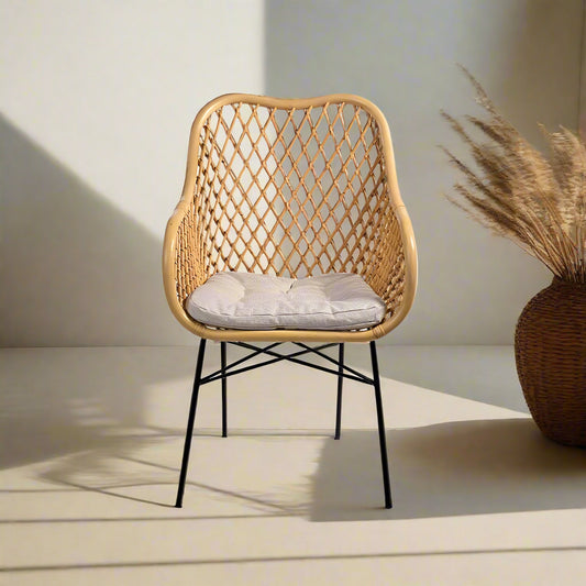 Add a touch of organic elegance to your living space with our beautifully crafted Woven Rattan Chair. With its timeless design and natural appeal, this chair seamlessly combines style and comfort