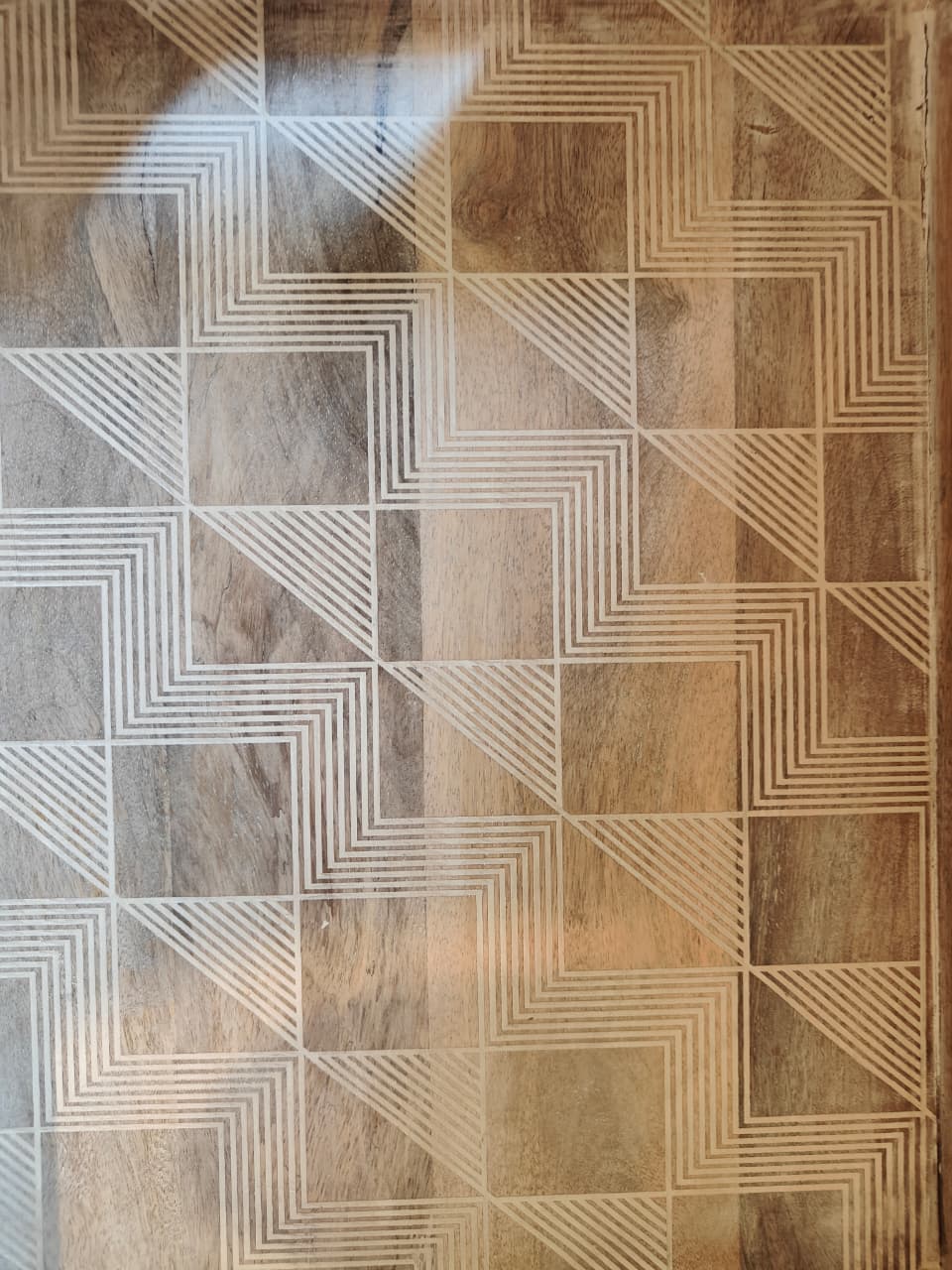 Patterned wooden surface with geometric design