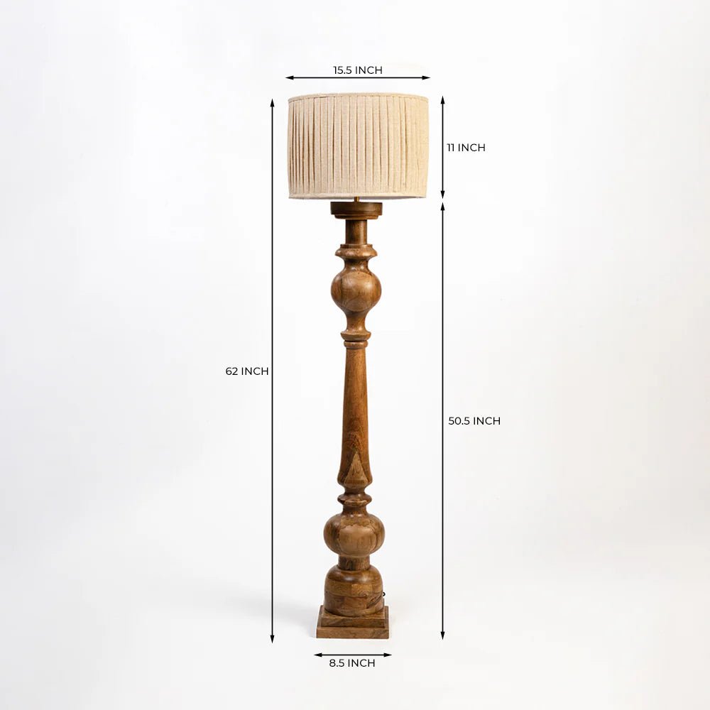 Wooden floor lamp with beige lampshade and dimensions labeled on a white background
