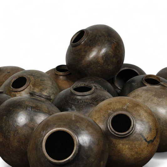 Large antique dark clay pot with natural finish, 20 inches tall and 23 inches diameter, handcrafted for home decor