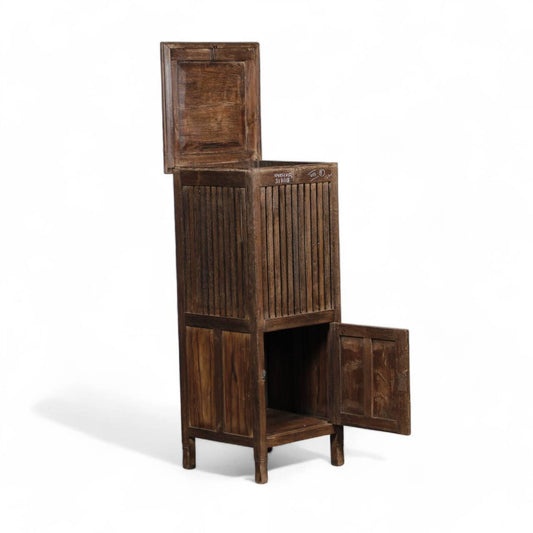 Wooden cabinet with open doors on a white background