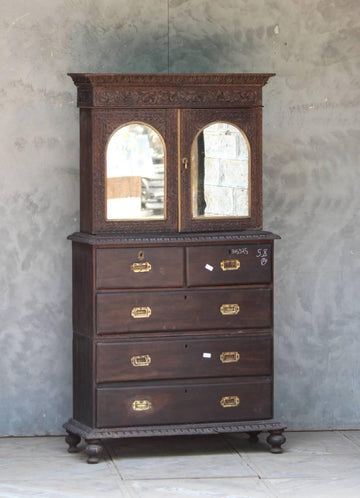 Antique wooden almirah with mirrored top section against textured wall – Tesu Furniture & Seating