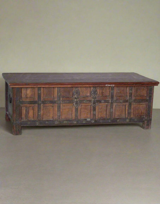 Close-up view of handcrafted wooden coffee table showing teak and recycled wood construction with iron details