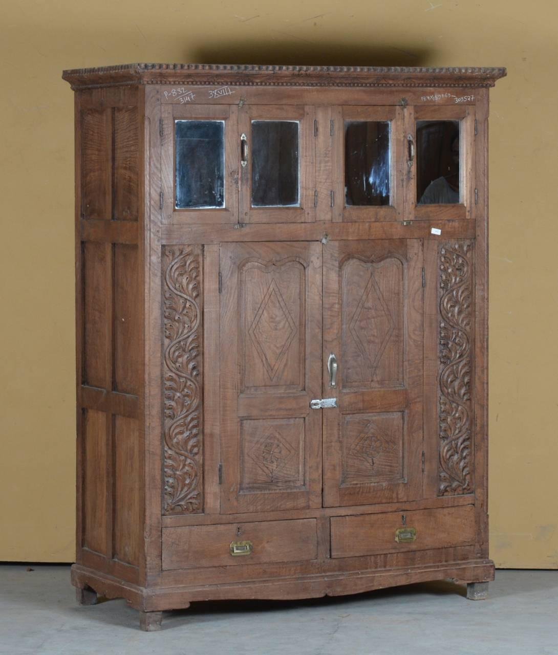 Detail of ornate carved panels on antique wooden giant almirah – Tesu Furniture & Seating
