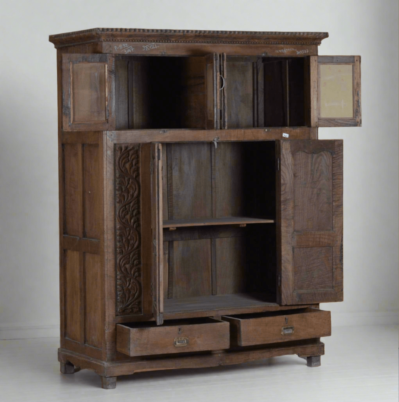 Antique wooden giant almirah with open carved doors on white background – Tesu Furniture & Seating