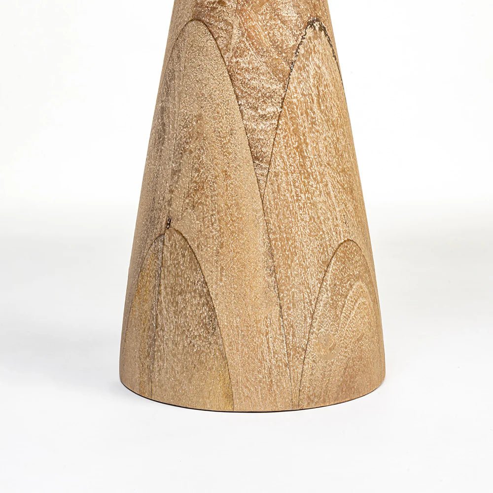 Wooden vase with a textured surface on a white background