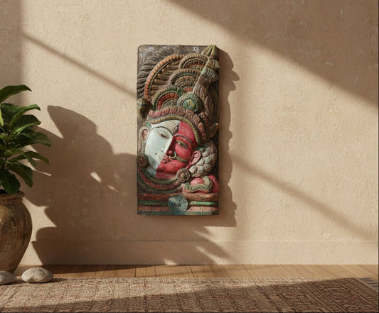 Decorative wall piece with a face design and intricate patterns on a white background