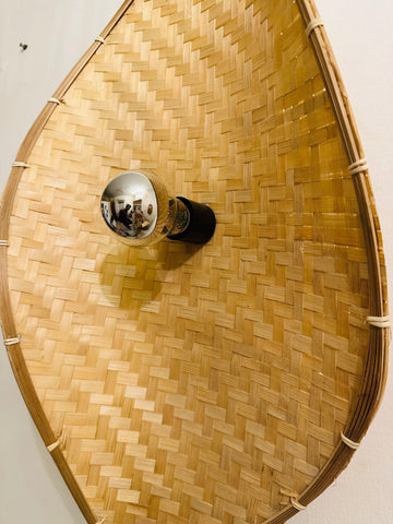 Handcrafted bamboo curve wall light with natural finish and warm ambient glow – Tesu Lamps & Lighting