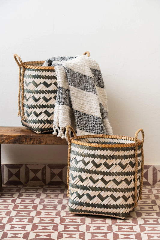 Handcrafted bamboo storage basket with sturdy handle, designed for stylish and eco-friendly organization while adding a natural touch to home décor.