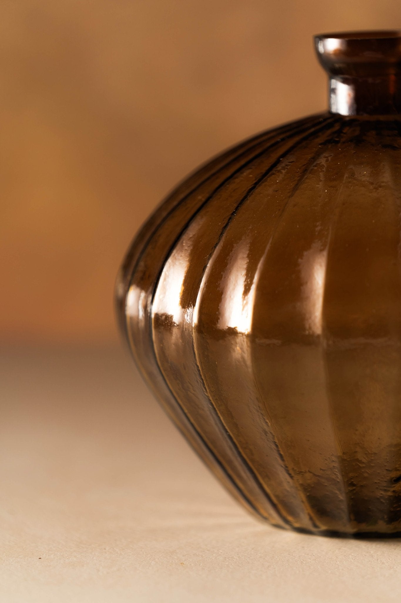 Side view of Genda Saaj Bloom Vase showcasing elegant curved silhouette