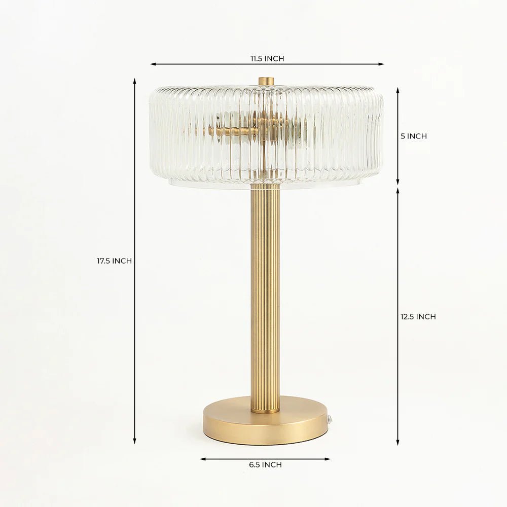 Table lamp with clear glass shade and gold base, shown with measurements on a white background