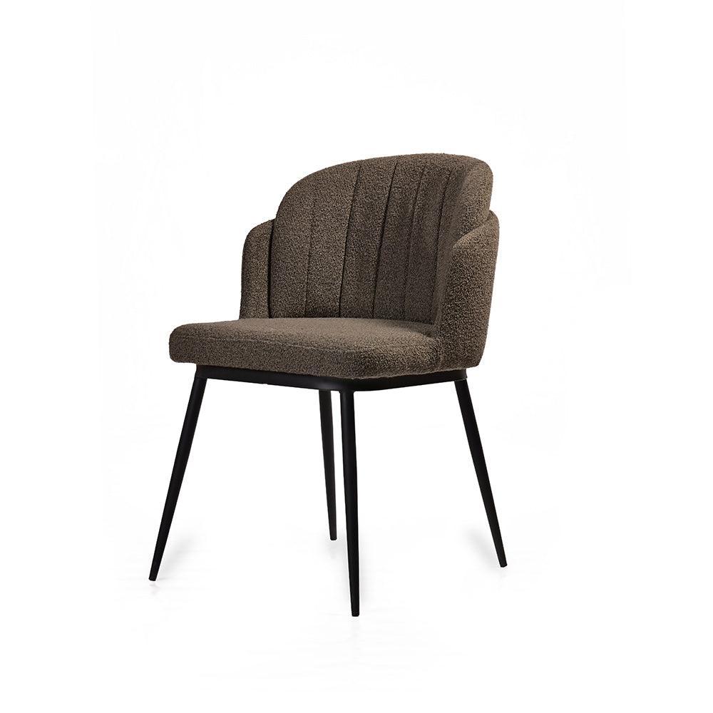 Brown upholstered chair with black legs on a white background